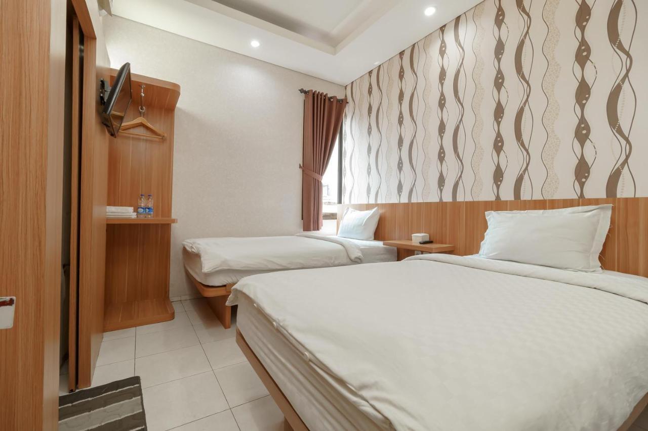 Wisma tamu Apple Near Sarinah Mitra Reddoorz 2*